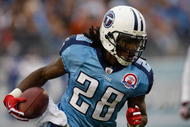 NASHVILLE, TN - NOVEMBER 29:  Chris Johnson #28 of the Tennessee Titans runs with the ball against the Arizona Cardinals during their game at LP Field on November 29, 2009 in Nashville, Tennessee.  (Photo by Streeter Lecka/Getty Images)