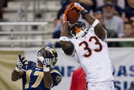 ST. LOUIS, MO - NOVEMBER 23:  Charles Tillman #33 of the Chicago Bears intercepts a pass intended for Donnie Avery #17 of the St. Louis Rams at the Edward Jones Dome on November 23, 2008 in St. Louis, Missouri.  The Bears beat the Rams 27-3.  (Photo by Dilip Vishwanat/Getty Images)