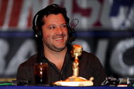 LAS VEGAS - DECEMBER 03:  Driver Tony Stewart smiles during the The Stewies on SIRIUS NASCAR Radio during NASCAR Sprint Cup Series Champions Week on December 3, 2009 in Las Vegas, Nevada.  (Photo by Rusty Jarrett/Getty Images for NASCAR)