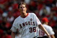 ANAHEIM, CA - OCTOBER 19:  Jered Weaver #36 of the Los Angeles Angels of Anaheim reacts in Game Three of the ALCS against the New York Yankees during the 2009 MLB Playoffs at Angel Stadium on October 19, 2009 in Anaheim, California.  (Photo by Kevork Djansezian/Getty Images)