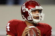 ARLINGTON, TX - SEPTEMBER 05: Quarterback Sam Bradford #14 of the Oklahoma Sooners drops back to pass against the Brigham Young Cougars at Cowboys Stadium on September 5, 2009 in Arlington, Texas. (Photo by Ronald Martinez/Getty Images)