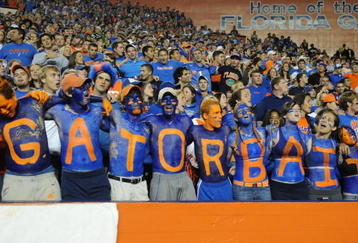 GAINESVILLE, FL - NOVEMBER 7: Student fans of the Florida Gators show team colors during play against the Vanderbilt Commodores  on November 7, 2009 at Ben Hill Griffin Stadium in Gainesville, Florida.  (Photo by Al Messerschmidt/Getty Images) 