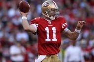 SAN FRANCISCO - NOVEMBER 29:  Alex Smith #11 of the San Francisco 49ers passes against the Jacksonville Jaguars during an NFL game at Candlestick Park on November 29, 2009 in San Francisco, California.  (Photo by Jed Jacobsohn/Getty Images)