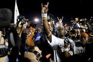 PASADENA, CA - JANUARY 04:  Quarterback Vince Young #10 of the Texas Longhorns celebrates after defeating the USC Trojans in the final moments of the BCS National Championship Rose Bowl Game at the Rose Bowl on January 4, 2006 in Pasadena, California.  Texas defeated USC 41-38.  (Photo by Harry How/Getty Images)