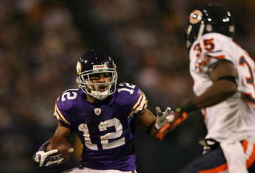 MINNEAPOLIS - NOVEMBER 29:  Percy Harvin #12 of the Minnesota Vikings carries the ball as Zackary Bowman #35 of the Chicago Bears defends on November 29, 2009 at Hubert H. Humphrey Metrodome in Minneapolis, Minnesota. The Vikings defeated the Bears 36-10.  (Photo by Elsa/Getty Images)
