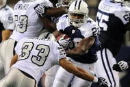 ARLINGTON, TX - NOVEMBER 26:  Running back Felix Jones #28 of the Dallas Cowboys runs the ball against Tyvon Branch #33 of the Oakland Raiders at Cowboys Stadium on November 26, 2009 in Arlington, Texas.  (Photo by Ronald Martinez/Getty Images)
