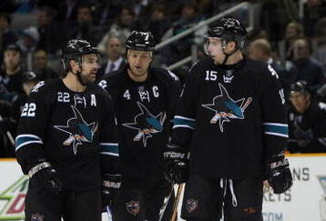 SAN JOSE, CA - DECEMBER 03:  Dan Boyle #22, Rob Blake #4 and Dany Heatley #15 of the San Jose Sharks skate on to the ice after a break in action during their game against the St. Louis Blues at HP Pavilion on December 3, 2009 in San Jose, California.  (Photo by Ezra Shaw/Getty Images)
