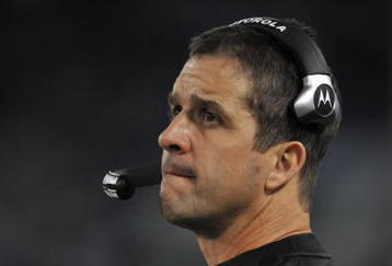 BALTIMORE - NOVEMBER 29:  Head coach John Harbaugh of the Baltimore Ravens coaches against the Pittsburgh Steelers at M&T Bank Stadium on November 29, 2009 in Baltimore, Maryland. The Ravens defeated the Steelers 20-17. (Photo by Larry French/Getty Images)