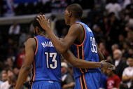 LOS ANGELES, CA - NOVEMBER 11:  Kevin Durant #35 of  the Oklahoma City Thunder celebrates with James Harden #13 in the final seconds of the game against the Los Angeles Clippers on November 11, 2009 at Staples Center in Los Angeles, California.   The Thunder won 83-79.   NOTE TO USER: User expressly acknowledges and agrees that, by downloading and/or using this Photograph, user is consenting to the terms and conditions of the Getty Images License Agreement.  (Photo by Stephen Dunn/Getty Images)
