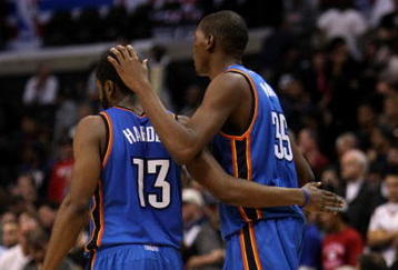 LOS ANGELES, CA - NOVEMBER 11:  Kevin Durant #35 of  the Oklahoma City Thunder celebrates with James Harden #13 in the final seconds of the game against the Los Angeles Clippers on November 11, 2009 at Staples Center in Los Angeles, California.   The Thunder won 83-79.   NOTE TO USER: User expressly acknowledges and agrees that, by downloading and/or using this Photograph, user is consenting to the terms and conditions of the Getty Images License Agreement.  (Photo by Stephen Dunn/Getty Images)