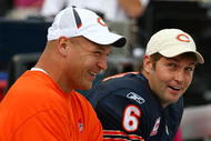 CHICAGO - OCTOBER 04: Injured linebacker Brian Urlacher #54 of the Chicago Bears laughs with Jay Cutler #6 on the bench during a game against the Detroit Lions on October 4, 2009 at Soldier Field in Chicago, Illinois. The Bears defeated the Lions 48-24. (Photo by Jonathan Daniel/Getty Images)