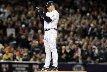 NEW YORK - NOVEMBER 04:  Starting pitcher Andy Pettitte #46 of the New York Yankees gets set to throw a pitch against the Philadelphia Phillies in Game Six of the 2009 MLB World Series at Yankee Stadium on November 4, 2009 in the Bronx borough of New York City. The Yankees won 7-3 to win the Series 4 games to 2.  (Photo by Jed Jacobsohn/Getty Images)