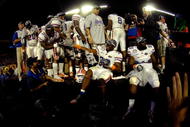 MIAMI - JANUARY 08:  Ahmad Black #35 and Dustin Doe #32 of the Florida Gators celebrate with the championship trophy after their 24-14 win against the Oklahoma Sooners during the FedEx BCS National Championship game at Dolphin Stadium on January 8, 2009 in Miami, Florida.  (Photo by Marc Serota/Getty Images)