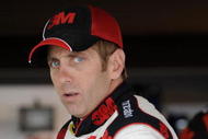 MARTINSVILLE, VA - OCTOBER 23: Greg Biffle, driver of the #16 3M/Filterete Ford, climbs into his car during practice for the NASCAR Sprint Cup Series TUMS Fast Relief 500 at Martinsville Speedway on October 23, 2009 in Martinsville, Virginia.  (Photo by John Harrelson/Getty Images)
