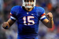 GAINESVILLE, FL - NOVEMBER 28:  Tim Tebow #15 of the Florida Gators celebrates after throwing a touchdown pass during the game against the Florida State Seminoles at Ben Hill Griffin Stadium on November 28, 2009 in Gainesville, Florida.  (Photo by Sam Greenwood/Getty Images)