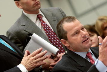WASHINGTON - FEBRUARY 13:  Major League Baseball pitcher Roger Clemens (R) explains why he recently met with his former nanny as his attorneys  Rusty Hardin (L) and Lanny Bruer stand behind him during a House Oversight and Government Reform Committee hearing about allegations of steroid use by professional ball players on Capitol Hill February 13, 2008 in Washington, DC. The 'Mitchell Report' named several former and current major league baseball players, including Clemens, who are accused of using steroids or other performance-enhancing drugs.  (Photo by Chip Somodevilla/Getty Images)