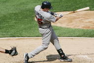 CHICAGO - JULY 26:  Mike Redmond #55 of the Minnesota Twins bats against the Chicago White Sox on July 26, 2006 at U.S. Cellular Field in Chicago, Illinois. The Twins defeated the White Sox 7-4. (Photo by Jonathan Daniel/Getty Images) 