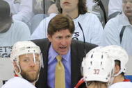 PITTSBURGH - JUNE 9:  Head coach Mike Babcock of the Detroit Red Wings talks to players as Kirk Maltby #18 looks on against the Pittsburgh Penguins during Game Six of the NHL Stanley Cup Finals at the Mellon Arena on June 9, 2009 in Pittsburgh, Pennsylvania. (Photo by: Harry How/Getty Images)