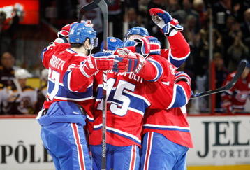MONTREAL- DECEMBER 4:  Members of the Montreal Canadiens celebrate the first period goal by Jaroslav Spacek #6 during the NHL game against the Boston Bruins on December 4, 2009 at the Bell Centre in Montreal, Quebec, Canada.  The Canadiens defeated the Bruins 5-1.  (Photo by Richard Wolowicz/Getty Images)