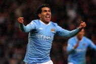 MANCHESTER, ENGLAND - DECEMBER 05:  Carlos Tevez of Manchester City celebrates scoring his team's second goal during the Barclays Premier League match between Manchester City and Chelsea at the City of Manchester Stadium on December 5, 2009 in Manchester, England.  (Photo by Alex Livesey/Getty Images)
