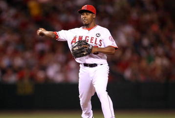 ANAHEIM, CA - AUGUST 11:  Chone Figgins #9 of the Los Angeles Angels of Anaheim throws to first against the Tampa Bay Rays on August 11, 2009 at Angel Stadium in Anaheim, California.  The Angels won 6-0.  (Photo by Stephen Dunn/Getty Images)