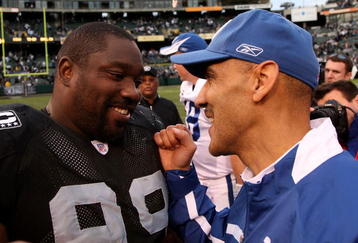 OAKLAND, CA - DECEMBER 16:  Head coach Tony Dungy of the Indianapolis Colts (R) greets defensive lineman Warren Sapp #99 of the Oakland Raiders after the game at McAfee Coliseum December 16, 2007 in Oakland, California. The Colts won 21-14.  (Photo by Stephen Dunn/Getty Images)