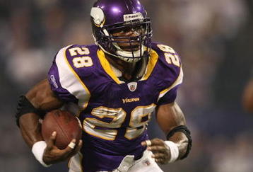 MINNEAPOLIS - NOVEMBER 22:  Adrian Peterson #28 of the Minnesota Vikings rushes against the Seattle Seahawks at Hubert H. Humphrey Metrodome on November 22, 2009 in Minneapolis, Minnesota.  (Photo by Nick Laham/Getty Images)