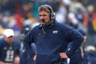 PITTSBURGH - DECEMBER 05: Head coach Dave Wannstedt of the University of Pittsburgh Panthers watches his team against the Cincinnati Bearcats on December 5, 2009 at Heinz Field in Pittsburgh, Pennsylvania.(Photo by Jared Wickerham/Getty Images)