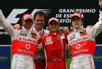 BARCELONA, SPAIN - MAY 13:  (L-R) Lewis Hamilton (2nd) of Great Britain and McLaren Mercedes, Felipe Massa (1st) of Brazil and Ferrari and Fernando Alonso (3rd) of Spain and McLaren Mercedes celebrate on the podium after the Spanish Formula One Grand Prix at the Circuit de Catalunya on May 13, 2007 in Barcelona, Spain.  (Photo by Paul Gilham/Getty Images)