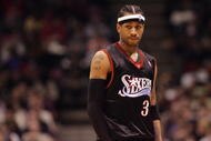EAST RUTHERFORD, NJ - DECEMBER 10:  Allen Iverson #3 of the Philadelphia 76ers looks on during a game against the New Jersey Nets at Continental Airlines Arena on December 10, 2005 in East Rutherford, New Jersey.  The Sixers defeated the Nets 107-95.  NOTE TO USER: User expressly acknowledges and agrees that, by downloading and or using this photograph, User is consenting to the terms and conditions of the Getty Images License Agreement. (Photo by Jim McIsaac/Getty Images)       