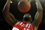 OAKLAND, CA - NOVEMBER 20:  Greg Oden #52 of the Portland Trail Blazers dunks against the Golden State Warriors during an NBA game at Oracle Arena on November 20, 2009 in Oakland, California.  (Photo by Jed Jacobsohn/Getty Images)