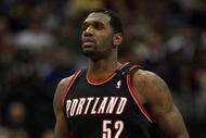 DALLAS - FEBRUARY 04:  Greg Oden #52 of the Portland Trail Blazers during play against the Dallas Mavericks on February 4, 2009 at American Airlines Center in Dallas, Texas.  NOTE TO USER: User expressly acknowledges and agrees that, by downloading and/or using this Photograph, user is consenting to the terms and conditions of the Getty Images License Agreement.  (Photo by Ronald Martinez/Getty Images)