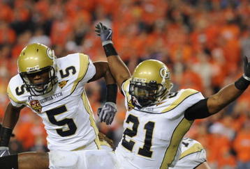 TAMPA, FL - DECEMBER 5: Running back Jonathan Dwyer #21 of the Georgia Tech Yellow Jackets celebrates a four-yard touchdown run with Stephen Hill #5 against the Clemson Tigers in the 2009 ACC Football Championship Game December 5, 2009 at Raymond James Stadium in Tampa, Florida.  (Photo by Al Messerschmidt/Getty Images)