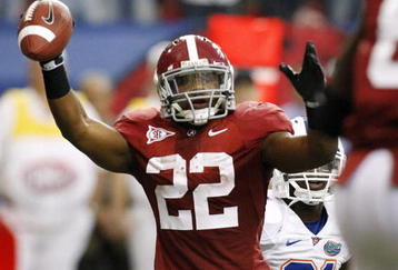 ATLANTA - DECEMBER 5:  Mark Ingram #22 of the Alabama Crimson Tide celebrates after he scored a 7-yard rushing touchdown in the first quarter against the Florida Gators during the SEC Championship game at Georgia Dome on December 5, 2009 in Atlanta, Georgia.  (Photo by Kevin C. Cox/Getty Images)