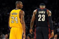 LOS ANGELES, CA - JANUARY 19:  Kobe Bryant #24 of the Los Angeles Lakers walks next to LeBron James #23 of the Cleveland Cavaliers during a break from the game at Staples Center on January 19, 2009 in Los Angeles, California.  (Photo by Harry How/Getty Images)