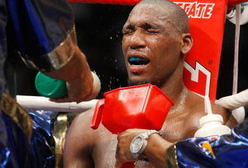 LAS VEGAS - APRIL 11:  Water is splashed on Paul Williams as he sits in his corner between rounds during his middleweight bout against Winky Wright at the Mandalay Bay Events Center April 11, 2009 in Las Vegas, Nevada. Williams won by unanimous decision.  (Photo by Ethan Miller/Getty Images)