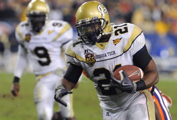TAMPA, FL - NOVEMBER 28:  Running back Jonathan Dwyer #21 of the Georgia Tech Yellow Jackets rushes upfield against the Clemson Tigers in the 2009 ACC Football Championship Game at Raymond James Stadium on December 5, 2009 in Tampa, Florida.  (Photo by Al Messerschmidt/Getty Images)