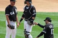 CHICAGO - JUNE 08: Manager Ozzie Guillen #13 of the Chicago White Sox calls for a relief pitcher as he removes starting pitcher Clayton Richard #54 from a game against the Detroit Tigers as A.J. Pierzynski #12 looks to the bullpen on June 8, 2009 at U.S. Cellular Field in Chicago, Illinois. The Tigers defeated the White Sox 5-4. (Photo by Jonathan Daniel/Getty Images)