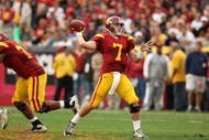 LOS ANGELES, CA - DECEMBER 05:  Quarterback Matt Barkley #7 of the USC Trojans throws a pass against the Arizona Wildcats on December 5, 2009 at the Los Angeles Coliseum in Los Angeles, California. Arizona won 21-17.  (Photo by Stephen Dunn/Getty Images)