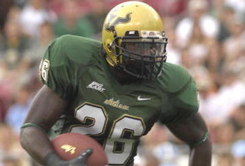TAMPA, FL - SEPTEMBER 22: Running back Mike Ford #26 of the University of South Florida Bulls rushes upfield against the North Carolina Tar Hells at Raymond James Stadium on September 22, 2007 in Tampa, Florida.  USF won 37-10. (Photo by Al Messerschmidt/Getty Images)