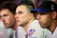 PHOENIX - AUGUST 10:  (L-R) Jeff Francoeur #12, David Wright #5 and Alex Cora #3 of the New York Mets watch from the dugout during the major league baseball game against the Arizona Diamondbacks at Chase Field on August 10, 2009 in Phoenix, Arizona. The Diamondbacks defeated the Mets 7-4.  (Photo by Christian Petersen/Getty Images)