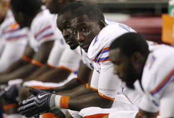 ATLANTA - DECEMBER 5:  Justin Williams #7 of the Florida Gators looks on dejected from the bench against the Alabama Crimson Tide during the SEC Championship game at Georgia Dome on December 5, 2009 in Atlanta, Georgia.  (Photo by Chris Graythen/Getty Images)