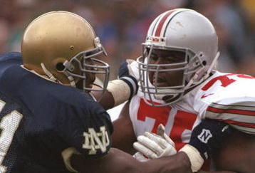 28 Mar 1996:  Offensive tackle Orlando Pace of the Ohio State Buckeyes blocks linebacker Melvin Dansby of the Notre Dame Fighting Irish during a game at Notre Dame Stadium in South Bend, Indiana.  Ohio State won the game 29-16. Mandatory Credit: Jonathan