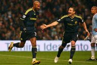 MANCHESTER, ENGLAND - DECEMBER 05:  Nicolas Anelka (L) of Chelsea celebrates with team mate Frank Lampard after Emmanuel Adebayor of Manchester City scored an own goal during the Barclays Premier League match between Manchester City and Chelsea at the City of Manchester Stadium on December 5, 2009 in Manchester, England. (Photo by Alex Livesey/Getty Images)