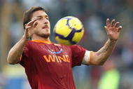 ROME - NOVEMBER 22:  Francesco Totti of AS Roma in action with the ball during the Serie A match between Roma and Bari at Stadio Olimpico on November 22, 2009 in Rome, Italy.  (Photo by Paolo Bruno/Getty Images)