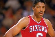 LOS ANGELES - 1987:  Julius Erving #6 of the Philadelphia 76ers rests during the 1987 game against the Los Angeles Lakers at the Great Western Forum in Los Angeles, California.  (Photo by Stephen Dunn/Getty Images)  