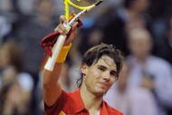 BARCELONA, SPAIN - DECEMBER 06:  Rafael Nadal of Spain salutes the crowd after beating Jan Hajek of Czech Republic in the fourth match of the Davis Cup final  between Spain and Czech Republic at the Palau Sant Jordi stadium on December 6, 2009 in Barcelona, Spain.  (Photo by Denis Doyle/Getty Images)