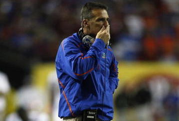 ATLANTA - DECEMBER 5:  Head coach Urban Meyer of the Florida Gators reacts after the Alabama Crimson Tide scored a touchdown in the first quarter during the SEC Championship game at Georgia Dome on December 5, 2009 in Atlanta, Georgia.  (Photo by Chris Graythen/Getty Images)