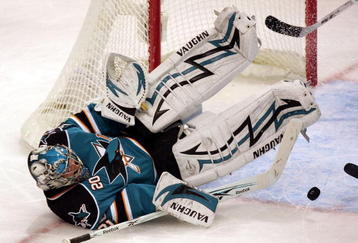 SAN JOSE, CA - OCTOBER 10:  Evgeni Nabokov #20 of the San Jose Sharks makes a diving save during their game against the Minnesota Wild at HP Pavilion on October 10, 2009 in San Jose, California.  (Photo by Ezra Shaw/Getty Images)