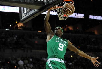 SAN ANTONIO - DECEMBER 03:  Guard Rajon Rondo #9 of the Boston Celtics makes the slam dunk against the San Antonio Spurs on December 3, 2009 at AT&T Center in San Antonio, Texas.  NOTE TO USER: User expressly acknowledges and agrees that, by downloading and/or using this Photograph, user is consenting to the terms and conditions of the Getty Images License Agreement.  (Photo by Ronald Martinez/Getty Images)